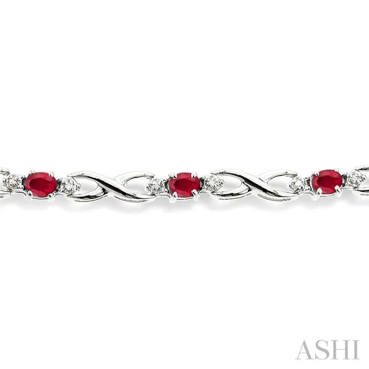 4x3 MM Oval Cut Ruby and 1/10 Ctw Single Cut Diamond Bracelet in 10K White Gold