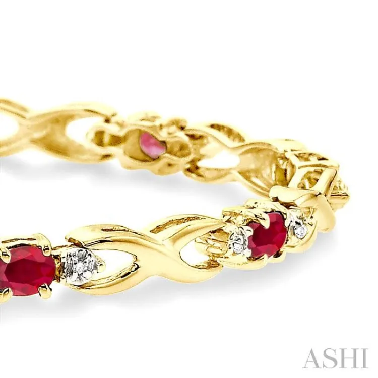 4x3mm Oval Cut Ruby and 1/10 Ctw Single Cut Diamond Bracelet in 10K Yellow Gold