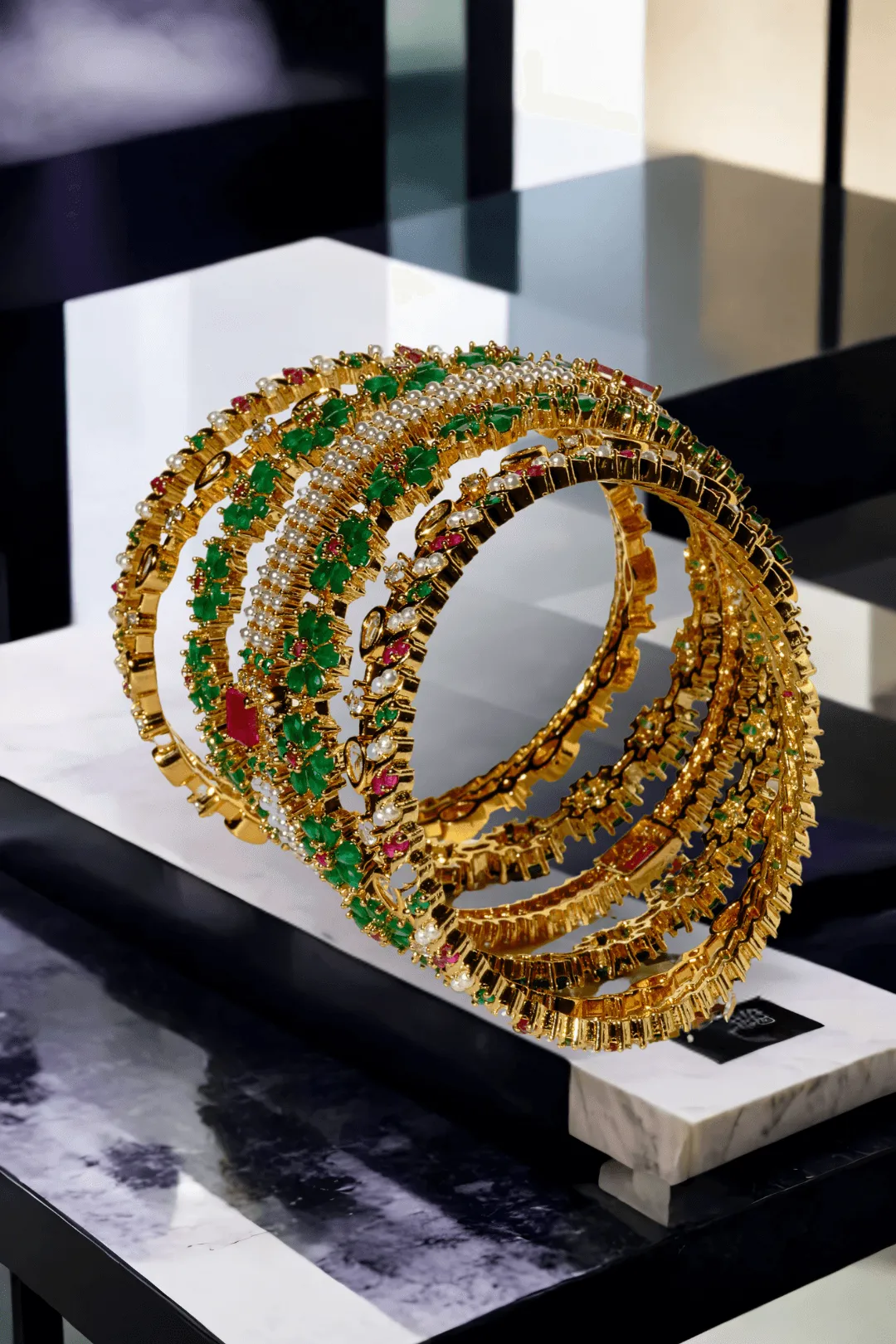 Arika 7-Piece Floral Gold-Plated Bangle Set with Emerald and Ruby Accents