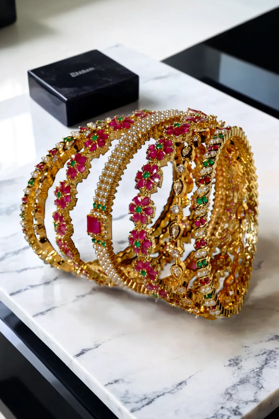 Arika 7-Piece Floral Gold-Plated Bangle Set with Emerald and Ruby Accents